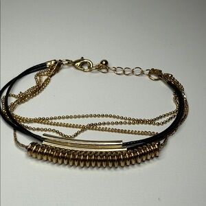 Modern Gold tone and Black multi strand delicate detail bracelet